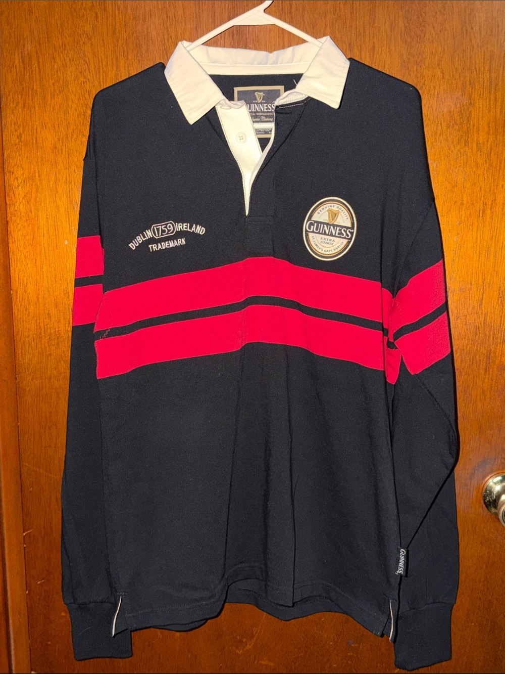 Guinness Black Rugby Top with Red Bands and White Collar